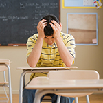 Frustrated student in classroom