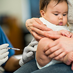 Baby getting vaccine